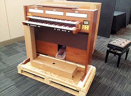 image moving a piano organ