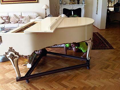 image moving a grand piano