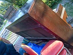 image of unwanted piano for disposal 2
